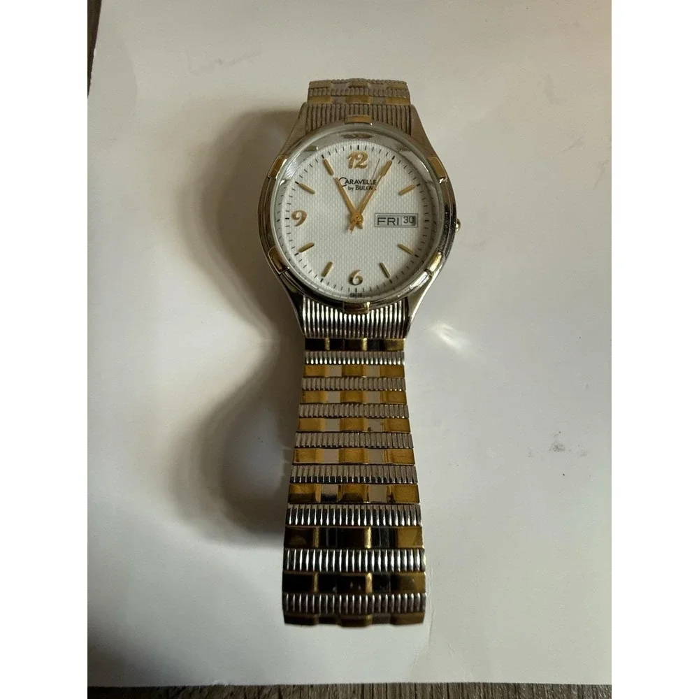 Caravelle by Bulova quartz watch — excellent condition, two-tone finish.